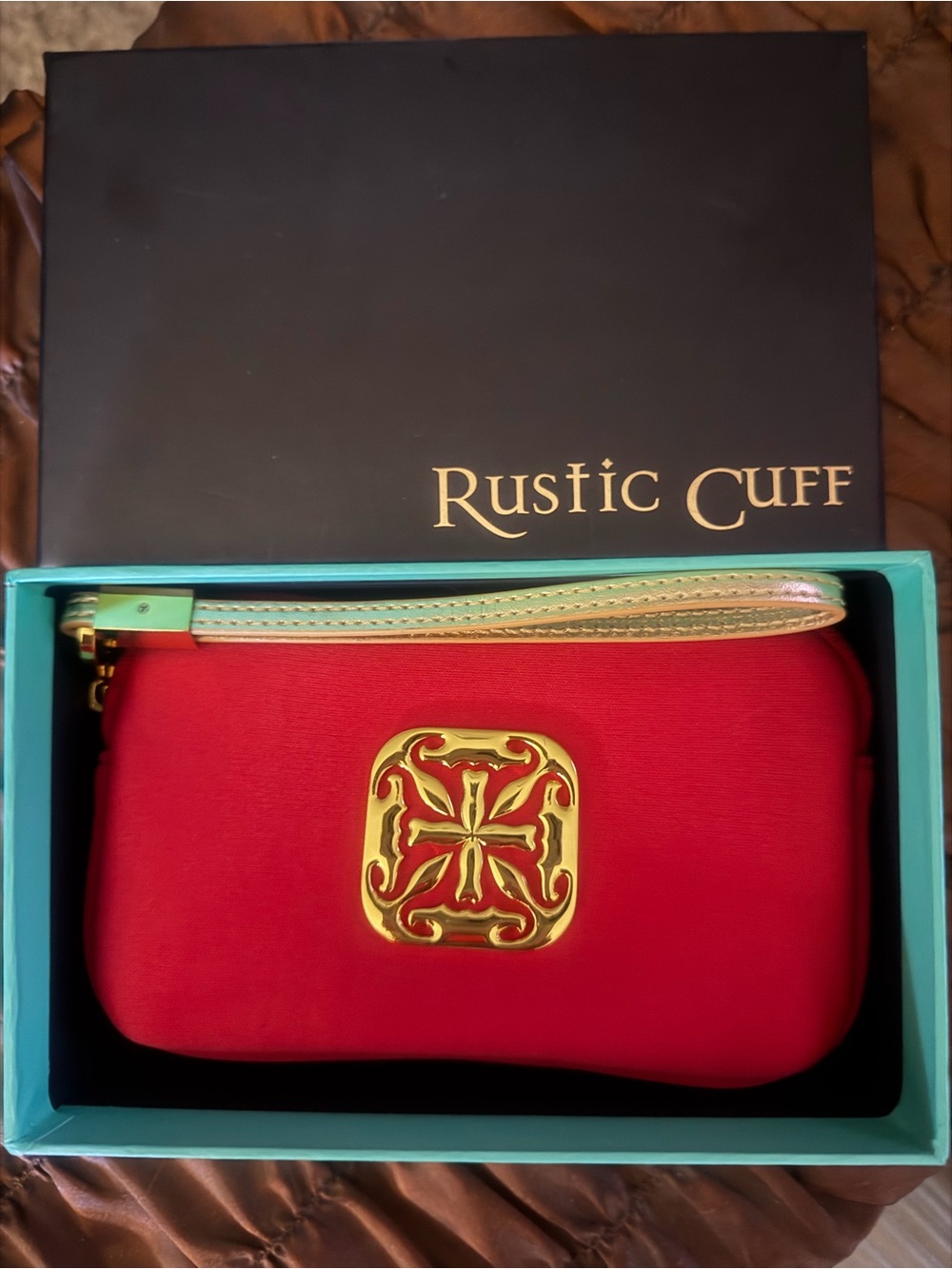 Rustic Cuff Red Wristlet with Gold Strap and Gold Emblem